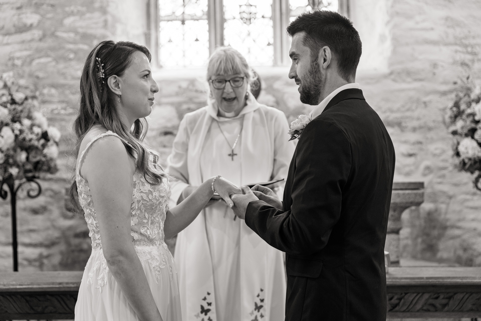 Putting the Wedding ring on the Brides finger, sealing the deal