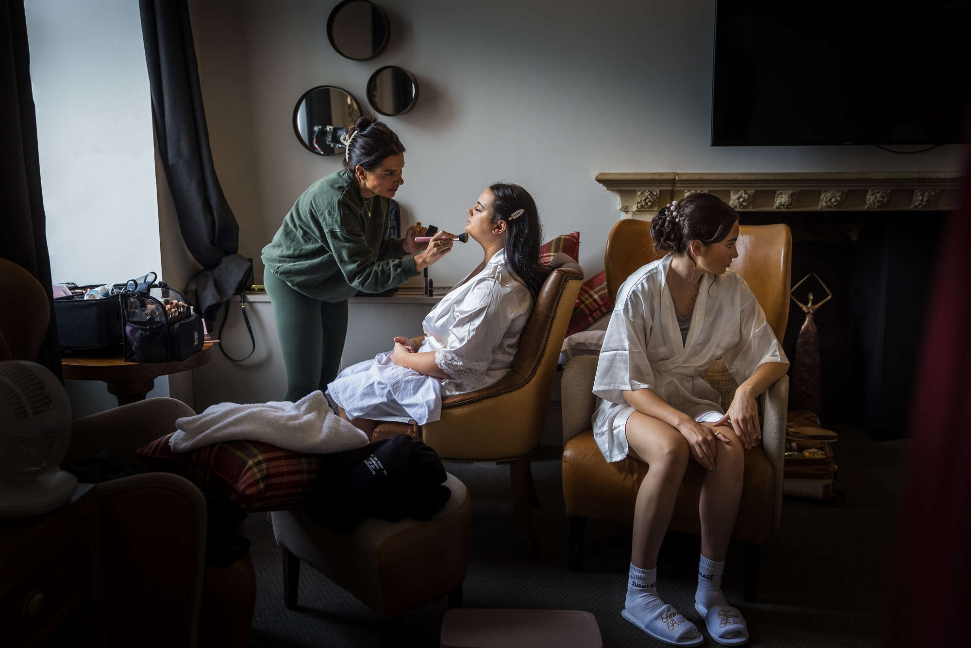 Bride & Bridesmaid getting ready for their wedding at the De Vere Beaumont Estate in Windsor. 