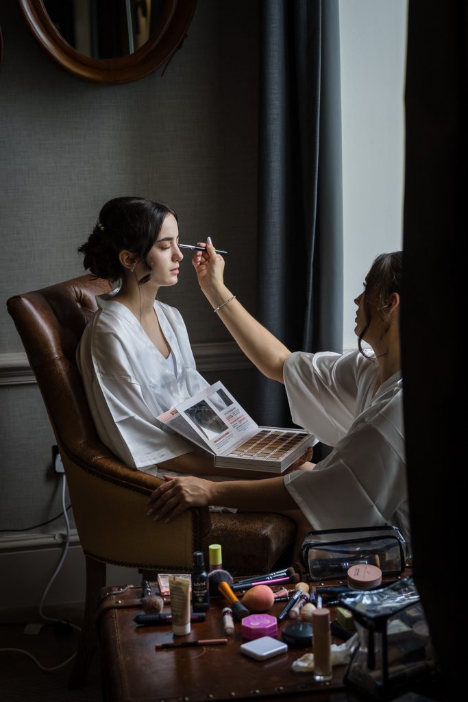 Bridesmaid having her makeup applied 