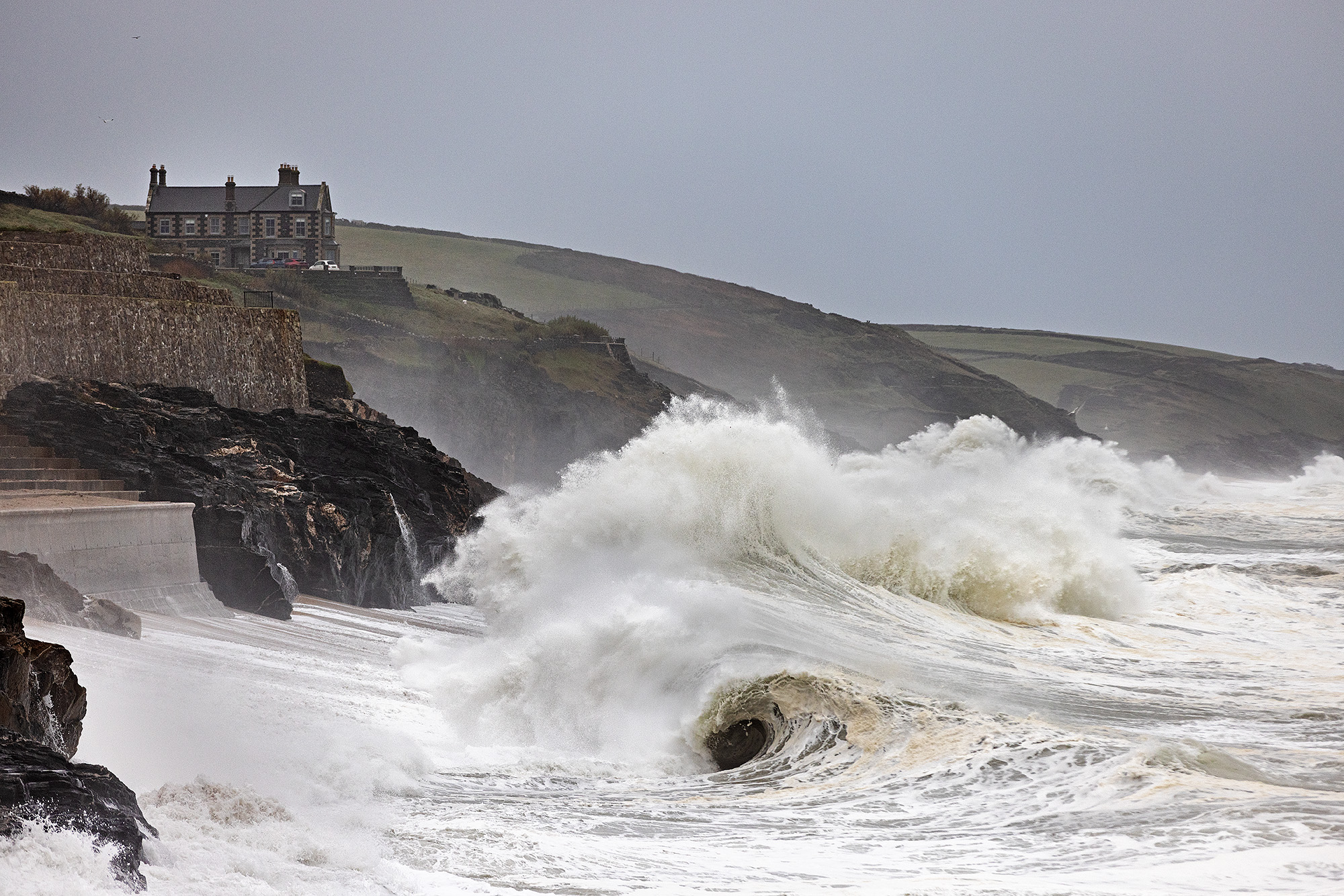 Huge waves from Storm Ciaran rolling up the beach in Porthleven, Cornwall.